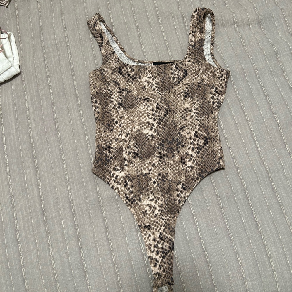 Kittenish faux snakeskin bodysuit. Never worn.